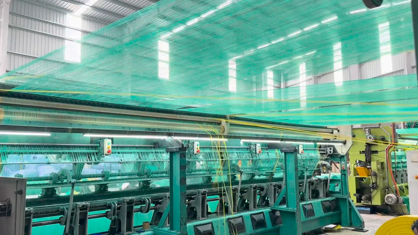 The production hall, looms in a row under the roof